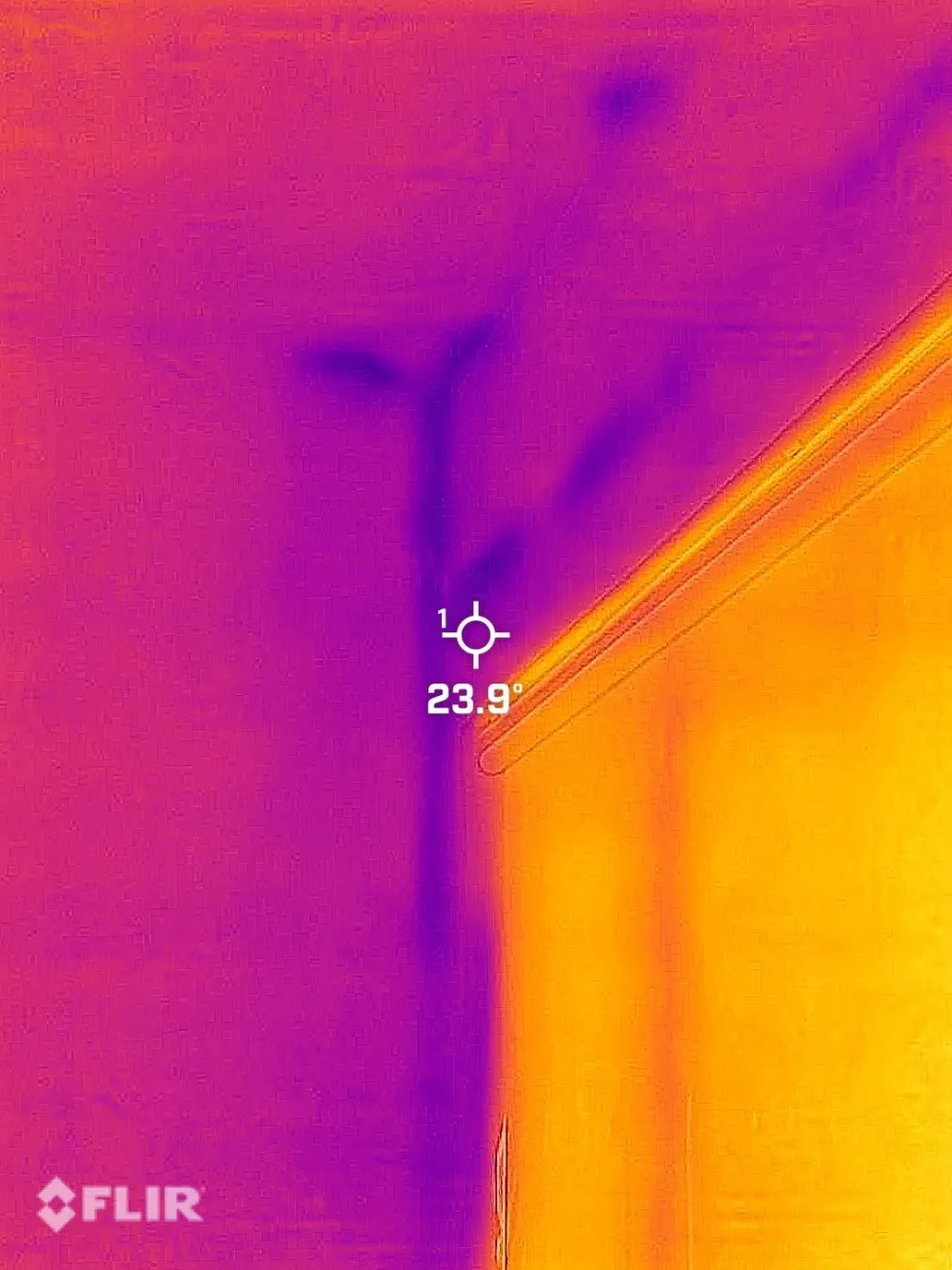 Infrared thermal scan revealing hidden moisture behind a wall during Nashville leak detection